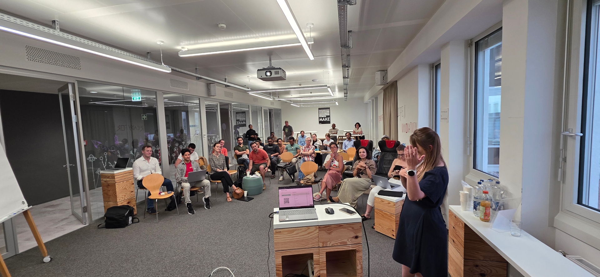 Participants seated at the Founder Institute Austria AI-native build night, laptops open during the build sprint.